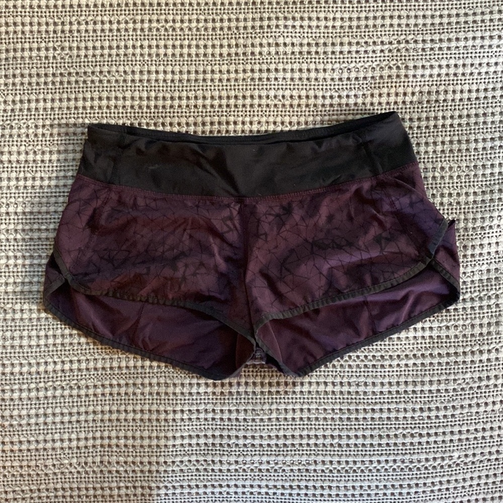 purple print lulu shorts.